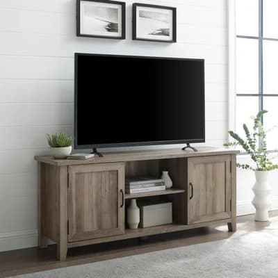 Wooden TV stand with sliding doors